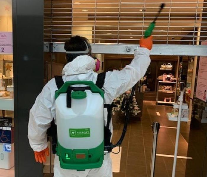 Employee doing a deep clean 